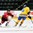 GRAND FORKS, NORTH DAKOTA - APRIL 18: Sweden's Marcus Davidsson #18 skates with the puck while Switzerland's Fabian Berni #9 defends during preliminary round action at the 2016 IIHF Ice Hockey U18 World Championship. (Photo by Minas Panagiotakis/HHOF-IIHF Images)

